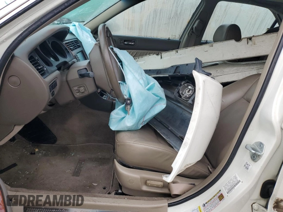 2004 Acura RL w/Navigation System with VIN JH4KA96684C001230, listed as a Copart auction lot 74801074 with 151,266 mi miles and Salvage Title. Bid and sale history available at carsss.com. Image 7.