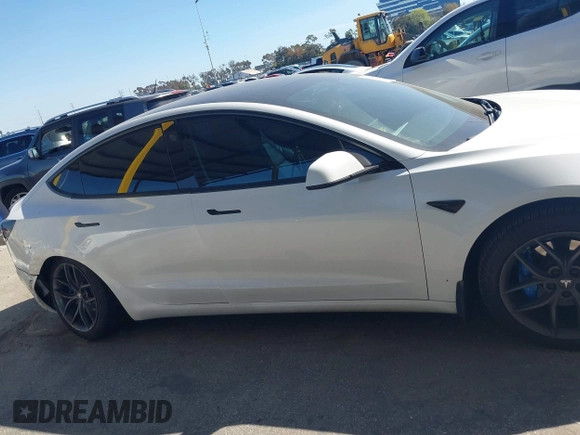 2020 Tesla Model 3 Standard Range Plus with VIN 5YJ3E1EA1LF659765, listed as a IAAI auction lot 41834411 with 42,433 mi miles and . Bid and sale history available at carsss.com. Image 13.