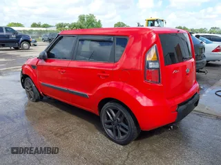 2011 Kia Soul + with VIN KNDJT2A21B7230986, listed as a IAAI auction lot 41683588 with 175,790 mi miles. Bid and sale history available at carsss.com. Image 3.