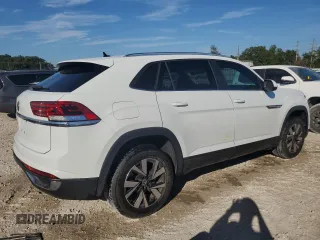 2023 Volkswagen Atlas SE z VIN 1V2DC2CA5PC214689, wystawiony jako Copart lot #77497274 z przebiegiem 29 838 mil mil oraz Nie do naprawy • Non repairable. Historia ofert i sprzedaży dostępna na DreamBid. Obrazek 3.