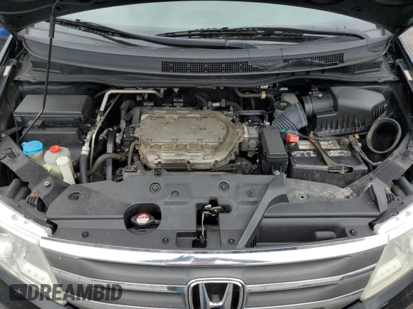 2013 Honda Odyssey EX-L with VIN 5FNRL5H69DB031498, listed as a Copart auction lot 55459745 with 129,773 mi miles and Salvage title. Bid and sale history available at DreamBid. Image 12.