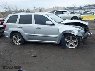 2007 Jeep Grand Cherokee SRT-8 with VIN 1J8HR78367C649237, listed as a IAAI auction lot 42019555 with 101,967 mi miles. Bid and sale history available at carsss.com. Image 13.