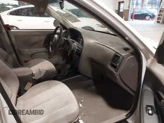 2005 Hyundai Elantra GLS with VIN KMHDN56D65U171907, listed as a IAAI auction lot 41051694 with 103,899 mi miles and . Bid and sale history available at DreamBid. Image 5.