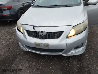 2010 Toyota Corolla with VIN 2T1BU4EE0AC245879, listed as a IAAI auction lot 41322200 with 128,574 mi miles. Bid and sale history available at carsss.com. Image 6.