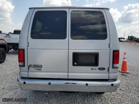 2014 Ford Econoline Wagon XL with VIN 1FBNE3BL0EDA47792, listed as a Copart auction lot 66011154 with 66,753 mi miles and Salvage Title. Bid and sale history available at carsss.com. Image 6.