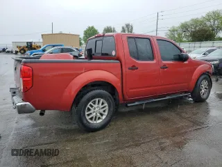 2015 Nissan Frontier SV with VIN 1N6AD0ER3FN717050, listed as a Copart auction lot 54595625 with 123,698 mi miles and Salvage title. Bid and sale history available at DreamBid. Image 3.