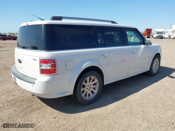 2012 Ford Flex SEL with VIN 2FMGK5CC5CBD22773, listed as a IAAI auction lot 41926348 with 124,420 mi miles. Bid and sale history available at carsss.com. Image 4.