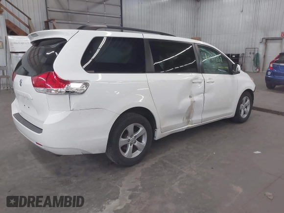 2011 Toyota Sienna LE AAS with VIN 5TDKK3DC6BS144970, listed as a IAAI auction lot 41881551 with 168,148 mi miles. Bid and sale history available at carsss.com. Image 4.