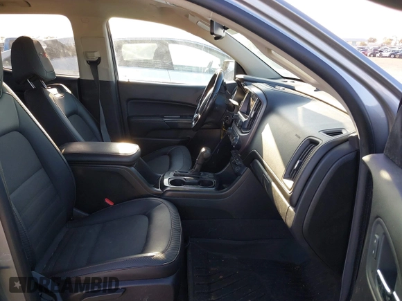 2021 GMC Canyon 4WD AT4 w/Leather with VIN 1GTG6FEN9M1123638, listed as a IAAI auction lot 41852163 with 77,442 mi miles. Bid and sale history available at carsss.com. Image 5.