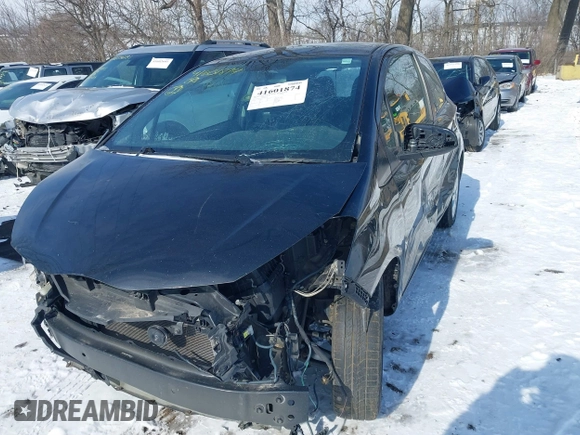 2015 Toyota Yaris L with VIN VNKJTUD34FA055116, listed as a IAAI auction lot 41601874 with 84,508 mi miles. Bid and sale history available at carsss.com. Image 2.
