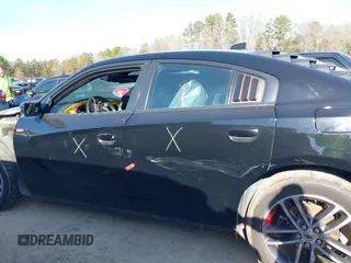 2019 Dodge Charger SXT with VIN 2C3CDXJG4KH710673, listed as a IAAI auction lot 41469797 with 102,011 mi miles and . Bid and sale history available at DreamBid. Image 15.
