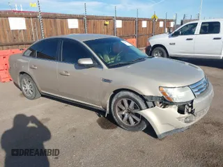 2008 Ford Taurus SEL with VIN 1FAHP24W38G111319, listed as a IAAI auction lot 41585092 with 216,419 mi miles. Bid and sale history available at carsss.com. Image 1.