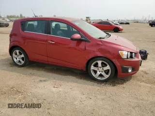 2012 Chevrolet Sonic LTZ with VIN 1G1JE6SH7C4111176, listed as a Copart auction lot 59002575 with 116,640 mi miles and Salvage title. Bid and sale history available at DreamBid. Image 4.