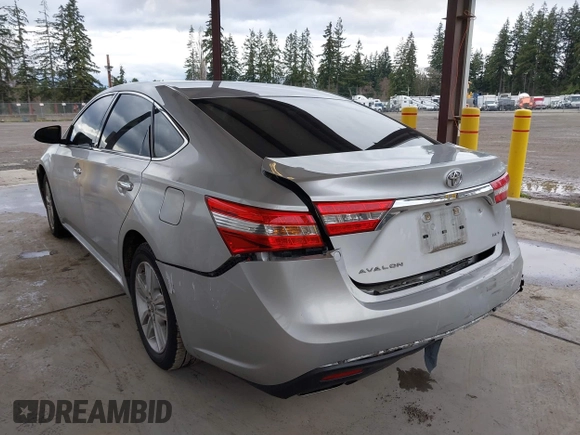 2014 Toyota Avalon Limited with VIN 4T1BK1EB3EU104576, listed as a IAAI auction lot 41773431 with 105,419 mi miles. Bid and sale history available at carsss.com. Image 3.