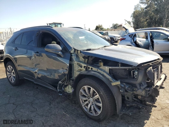 2020 Cadillac XT4 FWD Sport with VIN 1GYFZER44LF145993, listed as a Copart auction lot 77881204 with 43,606 mi miles and Salvage Title. Bid and sale history available at carsss.com. Image 4.