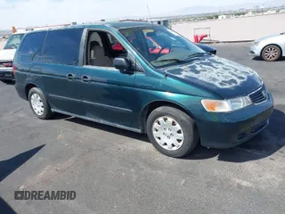 2000 Honda Odyssey LX z VIN 2HKRL1855YH565427, wystawiony jako IAAI lot #42009134 z przebiegiem 172 284 mil mil oraz . Historia ofert i sprzedaży dostępna na DreamBid. Obrazek 1.