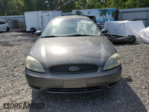 2004 Ford Taurus SE with VIN 1FAFP53U24A137741, listed as a Copart auction lot 54313915 with 92,739 mi miles and Salvage Title. Bid and sale history available at DreamBid. Image 5.