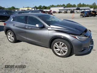 2018 Infiniti QX30 Luxury with VIN SJKCH5CP3JA060276, listed as a Copart auction lot 52947805 with 73,401 mi miles and Salvage title. Bid and sale history available at DreamBid. Image 4.