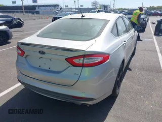 2016 Ford Fusion SE with VIN 3FA6P0H77GR125519, listed as a IAAI auction lot 42151384 with 248,933 mi miles and . Bid and sale history available at carsss.com. Image 4.