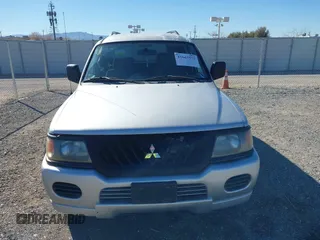 2003 Mitsubishi Montero Sport ES with VIN JA4LS21H23J002736, listed as a IAAI auction lot 41663572 with 235,704 mi miles. Bid and sale history available at carsss.com. Image 6.