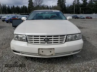 2000 Cadillac Seville Touring STS z VIN 1G6KY5497YU191639, wystawiony jako Copart lot #49658115 z przebiegiem 82 725 mil mil oraz Szkoda całkowita • Salvage title. Historia ofert i sprzedaży dostępna na DreamBid. Obrazek 5.