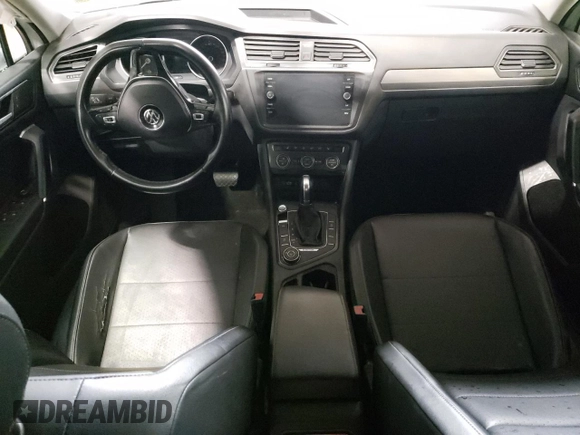 2018 Volkswagen Tiguan SEL with VIN 3VV2B7AX9JM065985, listed as a Copart auction lot 79404694 with Not provided miles and Salvage title. Bid and sale history available at DreamBid. Image 8.