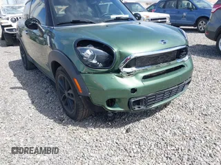2015 MINI Paceman S z VIN WMWSS7C56FWS44788, wystawiony jako IAAI lot #41835683 z przebiegiem 101 432 mil mil oraz . Historia ofert i sprzedaży dostępna na DreamBid. Obrazek 6.