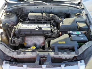 2003 Hyundai Accent GL with VIN KMHCG45CX3U488238, listed as a Copart auction lot 74399014 with 130,915 mi miles and Clean Title. Bid and sale history available at carsss.com. Image 11.