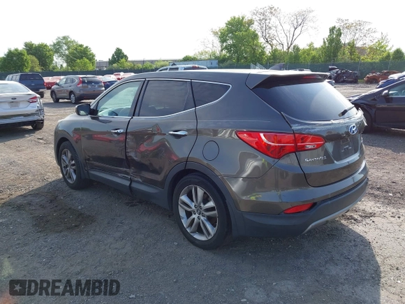 2013 Hyundai Santa Fe Sport z VIN 5XYZW3LA3DG068434, wystawiony jako IAAI lot #42167040 z przebiegiem 140 928 mil mil oraz . Historia ofert i sprzedaży dostępna na DreamBid. Obrazek 3.