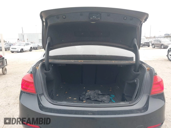 2013 BMW 3 Series 328i with VIN WBA3C1G59DNR47877, listed as a IAAI auction lot 41640493 with 106,689 mi miles and . Bid and sale history available at DreamBid. Image 17.