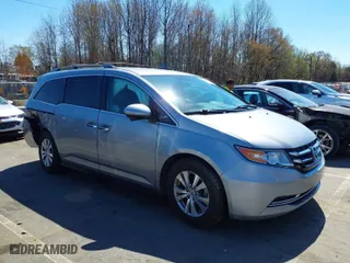 2016 Honda Odyssey SE with VIN 5FNRL5H38GB109733, listed as a IAAI auction lot 41882527 with 123,087 mi miles. Bid and sale history available at carsss.com. Image 1.