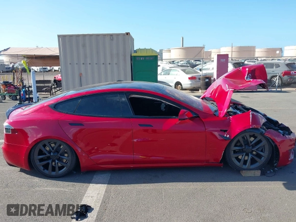 2022 Tesla Model S Plaid with VIN 5YJSA1E61NF460253, listed as a IAAI auction lot 40328727 with Not provided miles and . Bid and sale history available at DreamBid. Image 14.