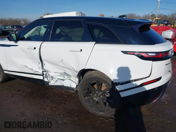 2022 Land Rover Range Rover Velar R-Dynamic S z VIN SALYT2EX7NA341627, wystawiony jako IAAI lot #41111238 z przebiegiem 18 982 mil mil oraz . Historia ofert i sprzedaży dostępna na DreamBid. Obrazek 6.
