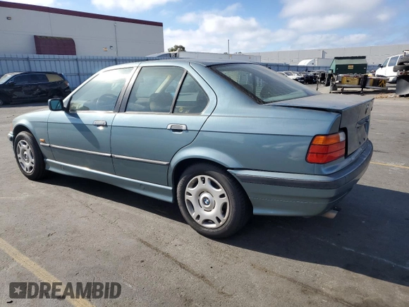 1998 BMW 3 Series 318i with VIN WBACC9322WEE60455, listed as a Copart auction lot 75950324 with 328,714 mi miles and Salvage Title. Bid and sale history available at carsss.com. Image 2.