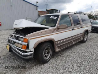1999 Chevrolet Suburban with VIN 3GNEC16R9XG143471, listed as a Copart auction lot 53856565 with 208,621 mi miles and Salvage title. Bid and sale history available at DreamBid. Image 1.
