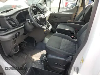 2023 Ford Transit Passenger XL with VIN 1FBAX2X86PKB35851, listed as a Copart auction lot 71126324 with 8,402 mi miles and Salvage Title. Bid and sale history available at DreamBid. Image 7.