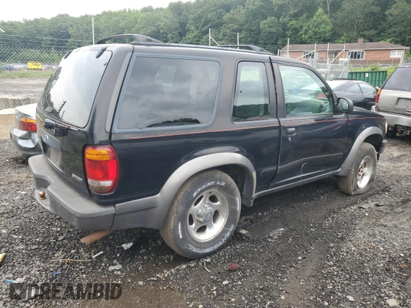 1998 Ford Explorer Sport with VIN 1FMYU24E8WUC31816, listed as a Copart auction lot 64379265 with 245,181 mi miles and Salvage title. Bid and sale history available at DreamBid. Image 3.