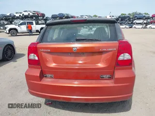 2010 Dodge Caliber Mainstreet z VIN 1B3CB3HA8AD598176, wystawiony jako IAAI lot #42090945 z przebiegiem 85 172 mil mil oraz . Historia ofert i sprzedaży dostępna na DreamBid. Obrazek 16.