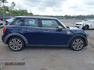 2017 MINI Hardtop 4 Door Cooper with VIN WMWXU1C54H2E19114, listed as a IAAI auction lot 42107266 with 83,524 mi miles and . Bid and sale history available at DreamBid. Image 14.