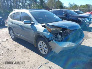2012 Honda CR-V EX-L with VIN 5J6RM3H71CL025890, listed as a IAAI auction lot 41153369 with 214,439 mi miles. Bid and sale history available at carsss.com. Image 1.