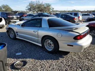 2002 Pontiac Firebird Formula z VIN 2G2FV22G822152907, wystawiony jako Copart lot #87459634 z przebiegiem 64 858 mil mil oraz Szkody całkowita. Historia ofert i sprzedaży dostępna na DreamBid. Obrazek 2.