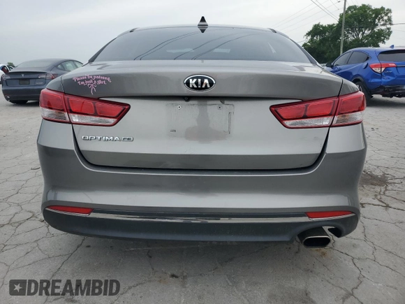 2018 Kia Optima S с VIN 5XXGT4L31JG183167, выставлен на аукционе Copart как лот 57238755 с пробегом 78 663 миль миль и Списание • Salvage title. История ставок и продаж доступна на DreamBid. Изображение 6.