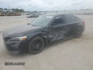 2023 Honda Civic Sport z VIN 2HGFE2F57PH520634, wystawiony jako Copart lot #51852665 z przebiegiem 52 641 mil mil oraz Szkoda całkowita • Salvage title. Historia ofert i sprzedaży dostępna na DreamBid. Obrazek 1.