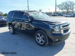 2018 Chevrolet Tahoe LT with VIN 1GNSCBKCXJR132867, listed as a IAAI auction lot 41456319 with 59,131 mi miles. Bid and sale history available at carsss.com. Image 1.
