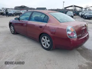 2002 Nissan Altima S with VIN 1N4AL11DX2C216559, listed as a IAAI auction lot 41540001 with 112,084 mi miles. Bid and sale history available at carsss.com. Image 3.
