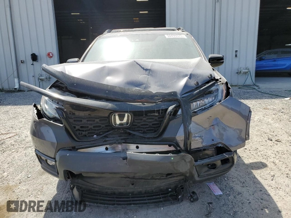 2021 Honda Passport Elite with VIN 5FNYF8H08MB014398, listed as a Copart auction lot 50499375 with 52,550 mi miles and Salvage Title. Bid and sale history available at DreamBid. Image 5.