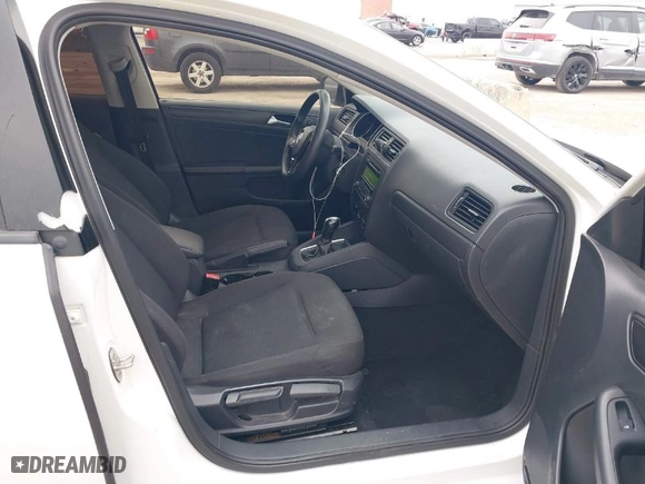 2015 Volkswagen Jetta Sedan 2.0L S with VIN 3VW2K7AJ1FM404527, listed as a IAAI auction lot 41404880 with 142,699 mi miles. Bid and sale history available at carsss.com. Image 5.