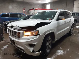 2015 Jeep Grand Cherokee Overland with VIN 1C4RJFCG2FC741015, listed as a IAAI auction lot 41607606 with 132,038 mi miles and . Bid and sale history available at DreamBid. Image 17.