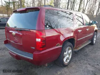 2009 Chevrolet Suburban LTZ with VIN 1GNFK36359R220094, listed as a IAAI auction lot 41858436 with 247,913 mi miles. Bid and sale history available at carsss.com. Image 4.