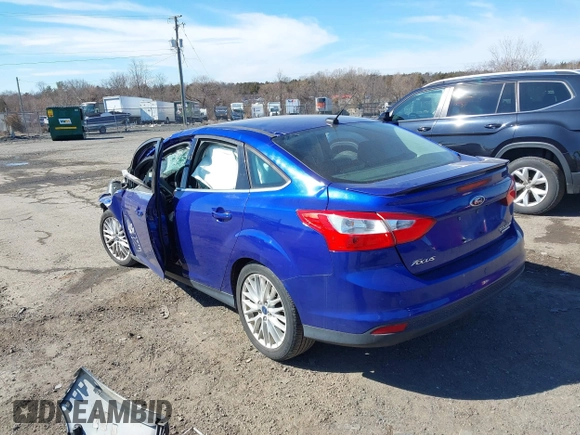 2014 Ford Focus Titanium with VIN 1FADP3J21EL427066, listed as a IAAI auction lot 41653163 with 1 mi miles. Bid and sale history available at carsss.com. Image 3.